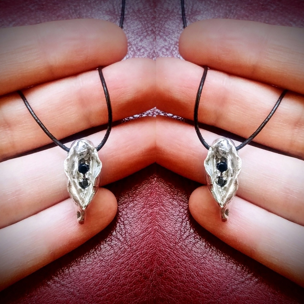 Sterling Silver and black Spinnel Yoni necklace